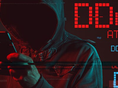 DDos attack types hacker with tablet