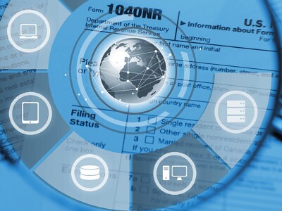 Magnifying glass depicting forensic accounting tasks