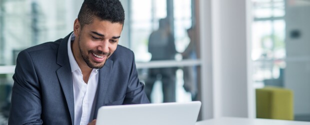 Businessman focused on laptop in the office