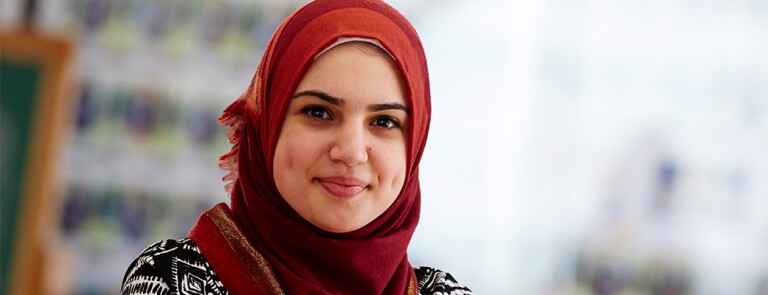 Front facing woman smiling at camera