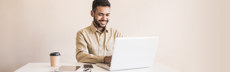 Man using laptop in office