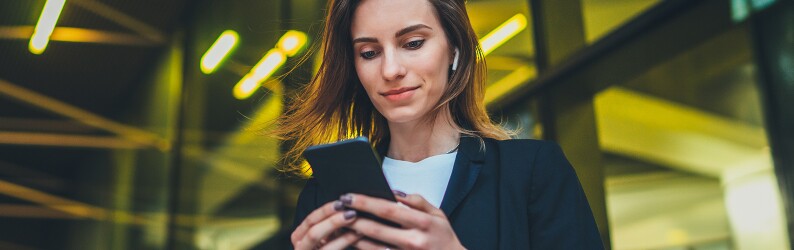 Female lawyer outside using her smart phone
