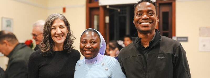 Students and faculty engaging at a community gathering at Santa Clara University