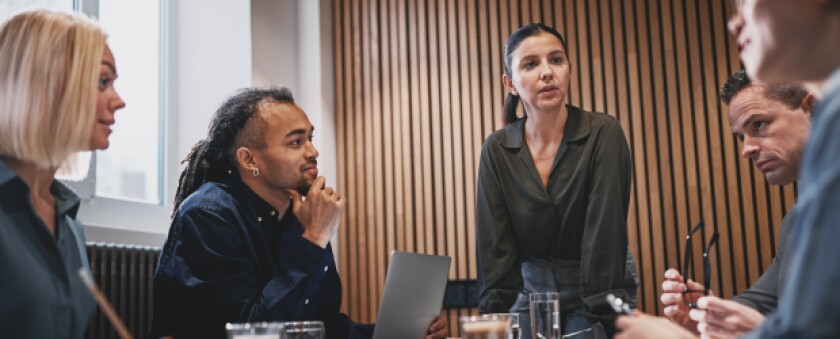 group-of-professionals-meeting-in-office