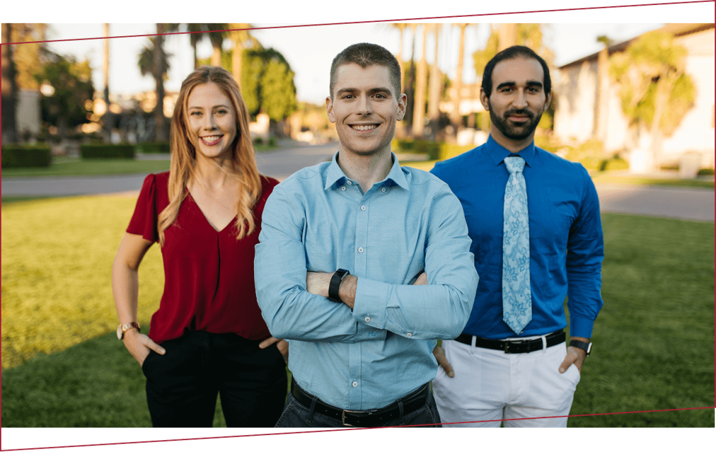 Group of three Santa Clara university students standing outside on campus