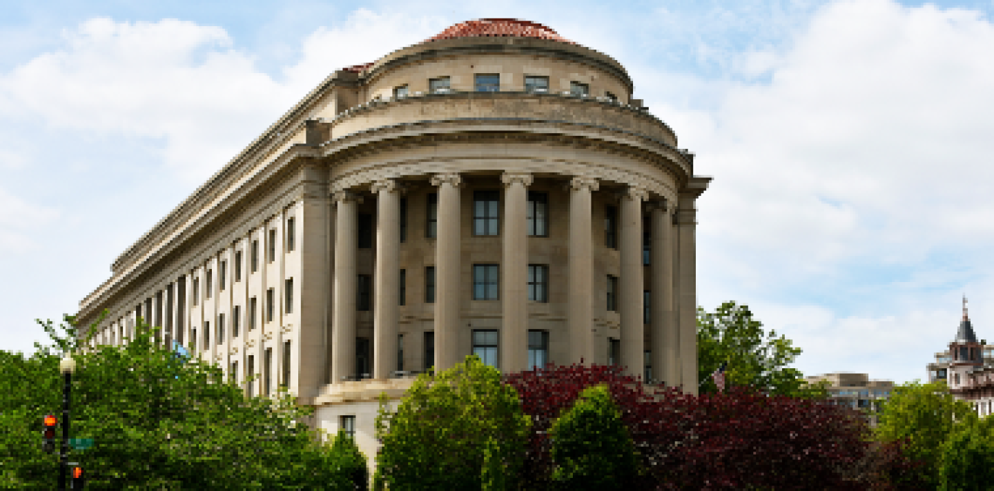 building with a round doric columned facade
