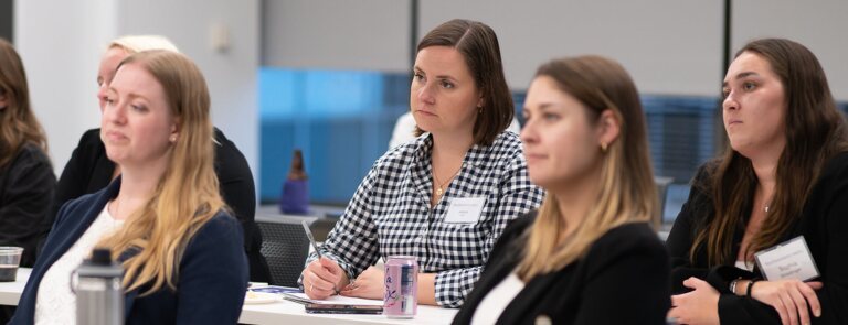 Room of female students listening to a presentation