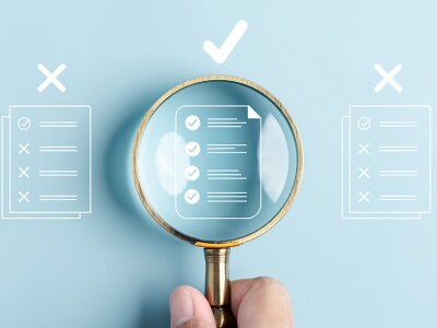 Inspecting the details of four options with a magnifying glass