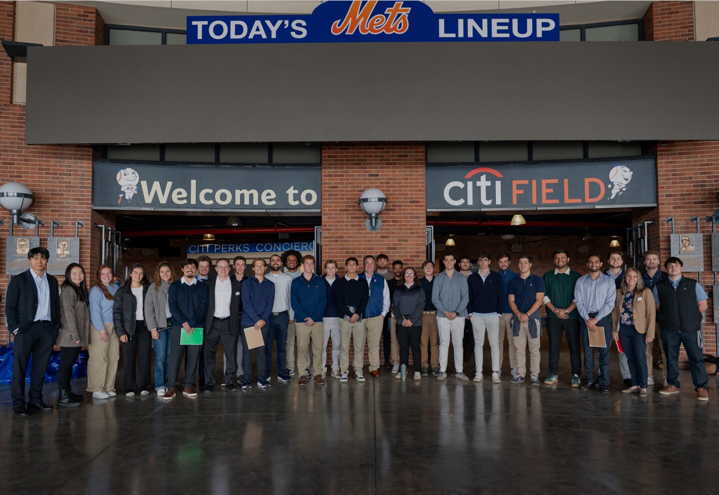 Large group photo of University of New Haven students while visiting Citi Field