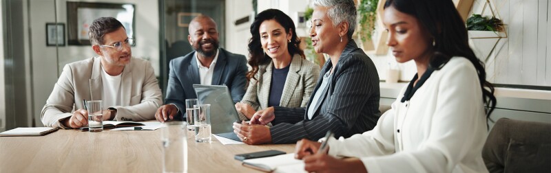 Diverse group of accounting professionals in a meeting