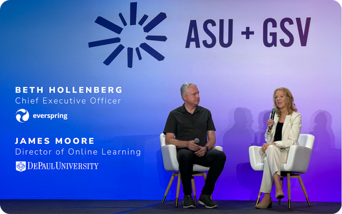 Beth Hollenberg and James Moore speak on stage at ASU+GSV, seated in front of a purple backdrop with logos and titles.
