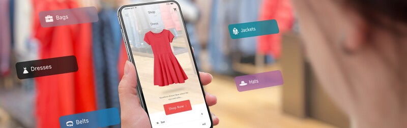 Shopping with smart phone and augmented reality app showing a dress.
