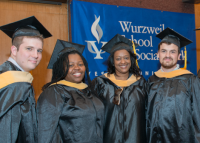Graduates standing together