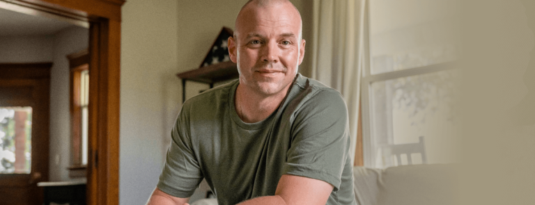 Army veteran seated in home