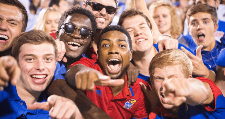Crowd of KU students cheering at a game