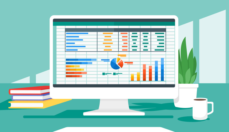Computer with spreadsheets on the screen.