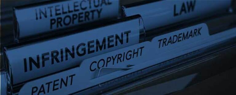 Files labeled intellectual property, infringement, patent, copyright, trademark, and law