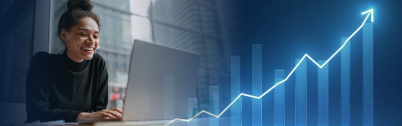 A woman smiling while working on a laptop, with a rising graph overlay symbolizing the growth in social worker job opportunities.