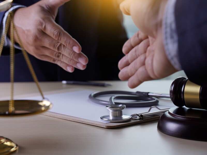 Law gavel stethoscope Health care business rules