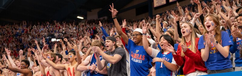 Crowd shot of KU students at a Jayhawks basketball game.