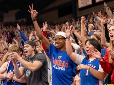 Crowd shot of KU students at a Jayhawks basketball game.