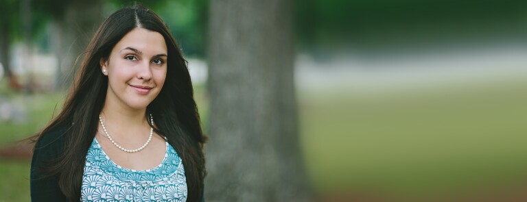 Woman-Smiling-Facing-Camera