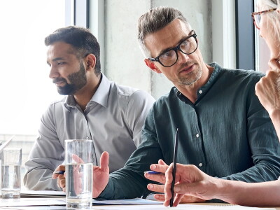 Colleagues work collaboratively in a meeting