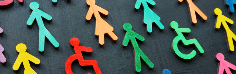 wooden cut outs of different color people