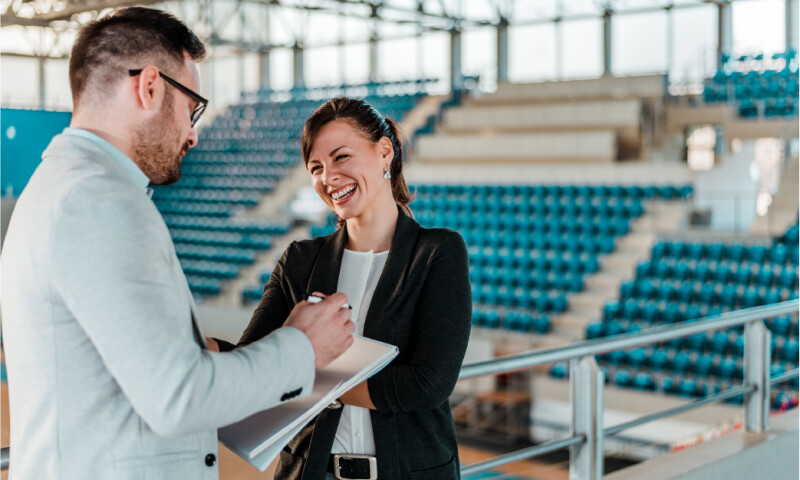 Facility-Director-With-Clipboard-In-Arena