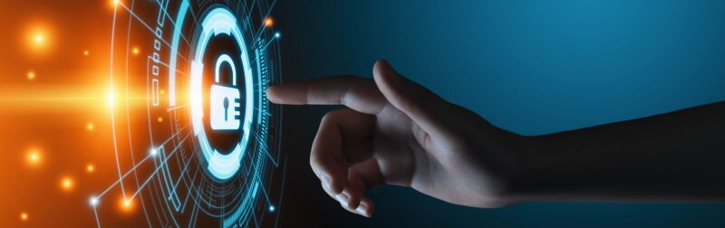 Student's hand pressing a lock icon in a virtual cyber security data protection business technology program.