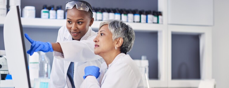 two women working on data science