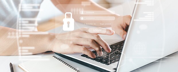 developer on laptop using reverse engineering software