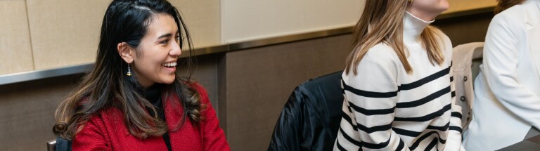 woman smiling at her colleagues