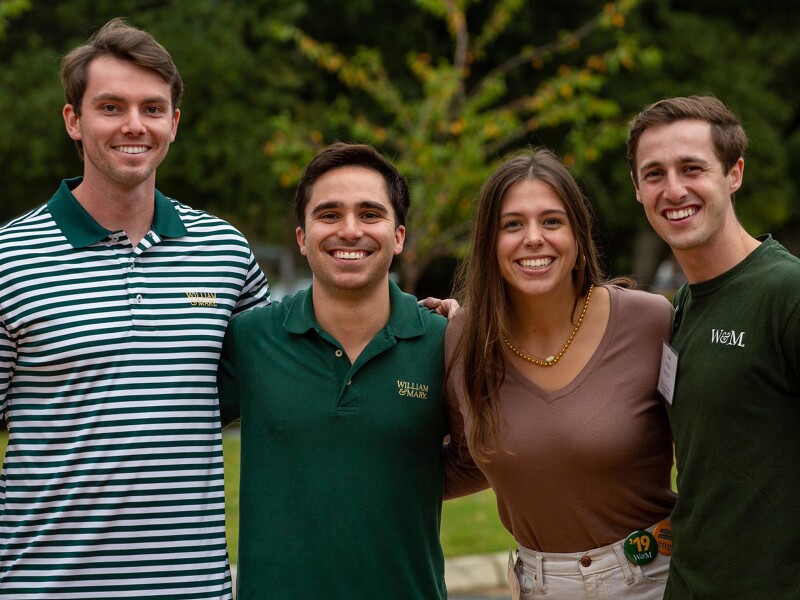 Four smiling students
