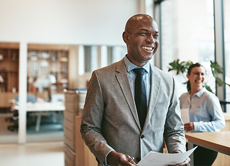 Happy-Businessman-In-Office