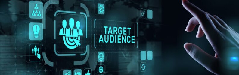Poised over a screen, a hand points to a button reading, "Target Audience"