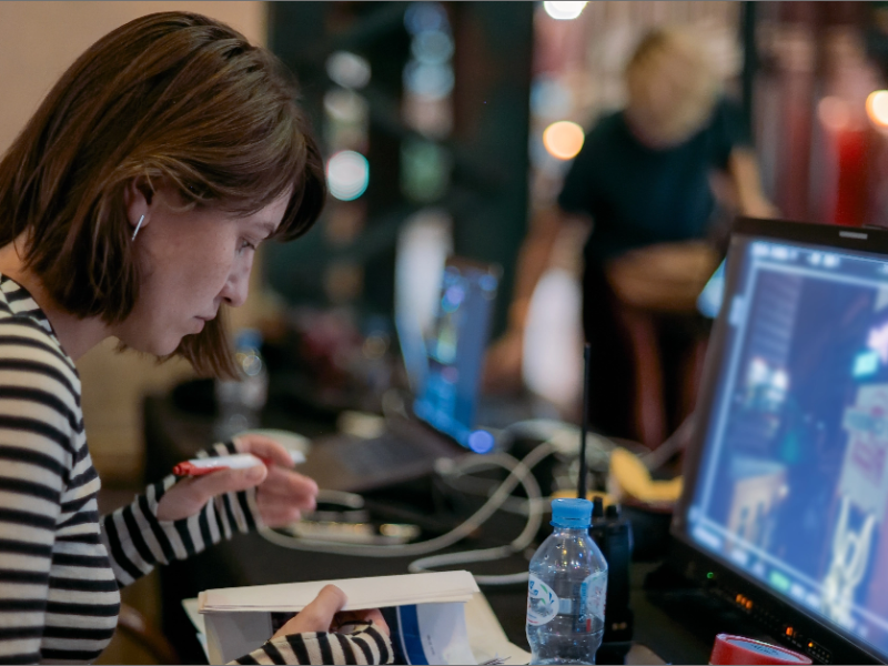 Director on set editing footage