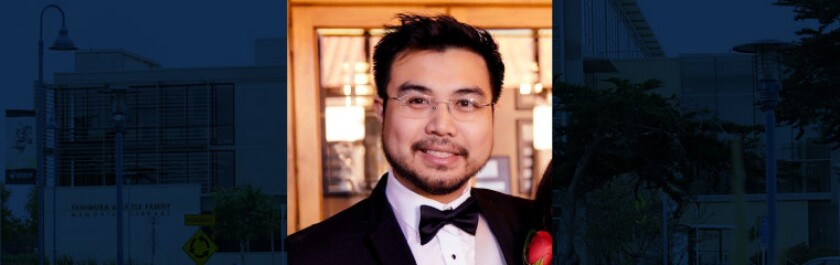 Photo of Luke Gray in a tuxedo