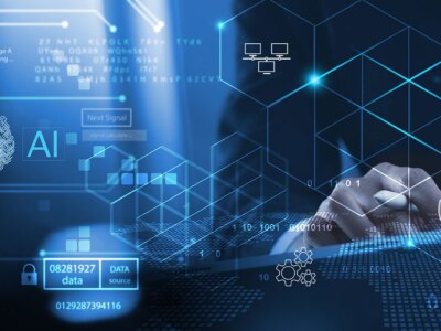 Concept of businessman using digital table to review AI technology to increase business productivity.