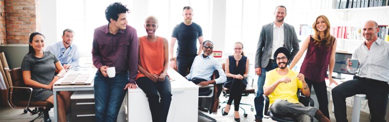 Business leader gathers with colleagues in the office to foster a good workplace.