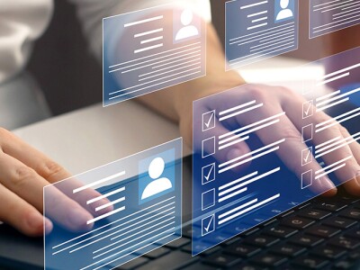 Person at laptop which is analyzing customer data.