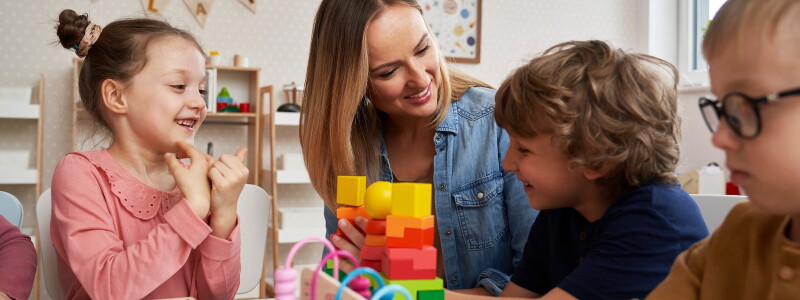 A teacher works with a class of diverse learners.