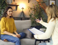 SocialWorker-And-Patient-Sitting-In-Session