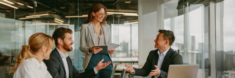 Professionals collaborate in an office setting