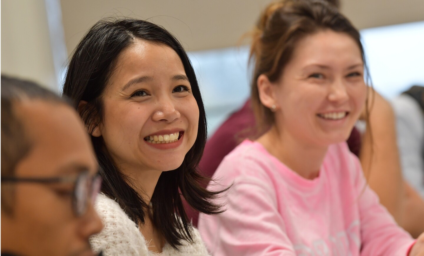 Smiling Kent State student in class