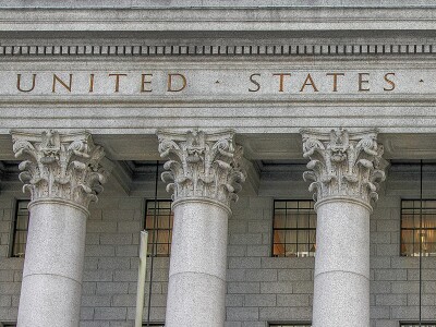 United Stated Court House federal building with six ornate columns,