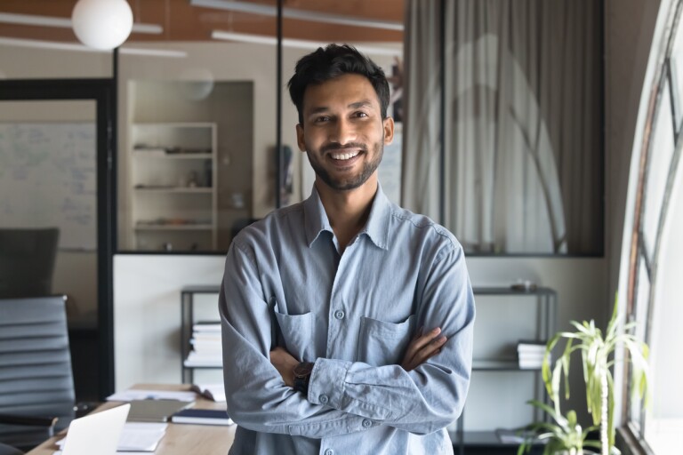 front facing man with arms crossed
