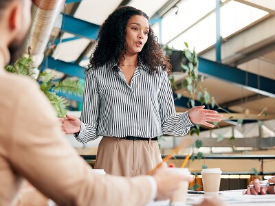 Woman leading a marketing team meeting