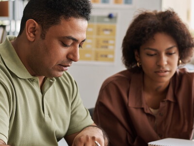 Group of multiethnic students learning foreign language together in class