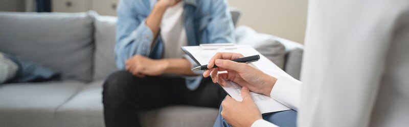 writing down notes from client